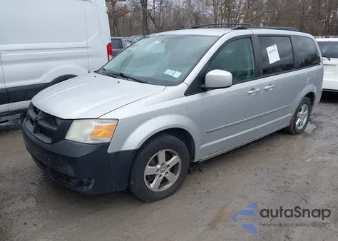 2010 Dodge Grand Caravan Sxt z USA, uszkodzony, nr VIN 2D4RN5D12AR119896